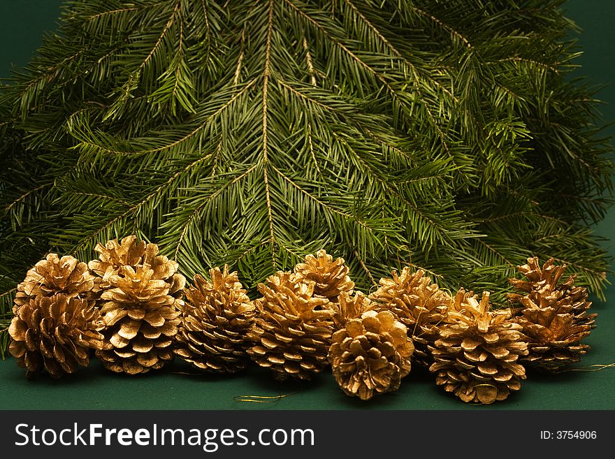 Christmas tree background with cones, copy space on top and center. Christmas tree background with cones, copy space on top and center