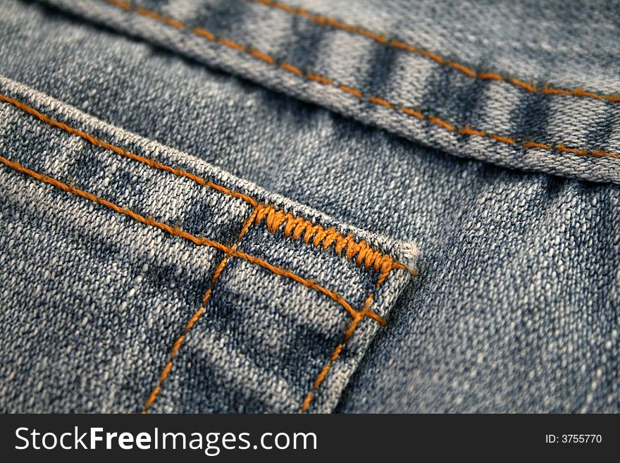 Close - up shot of jeans trousers.