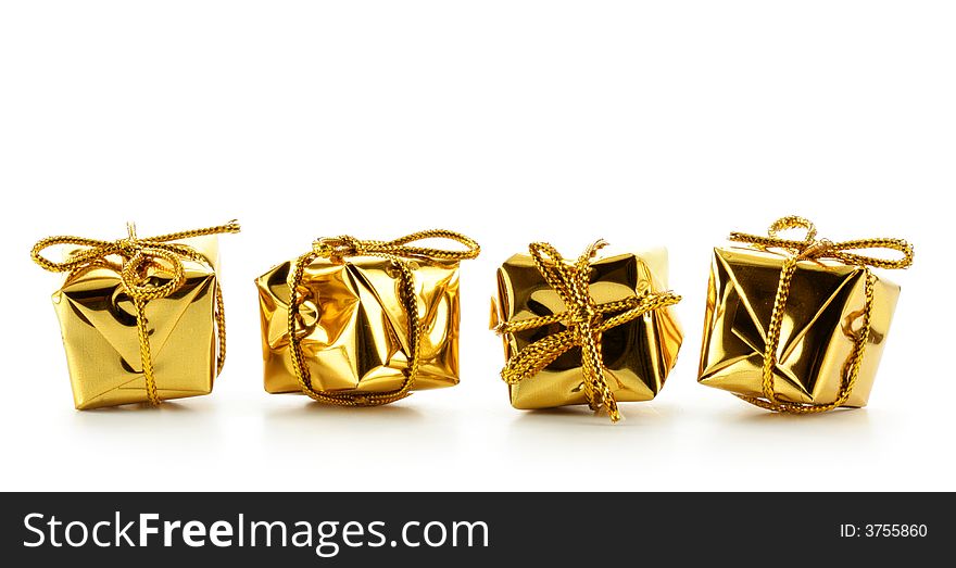Four golden boxes isolated over white background
