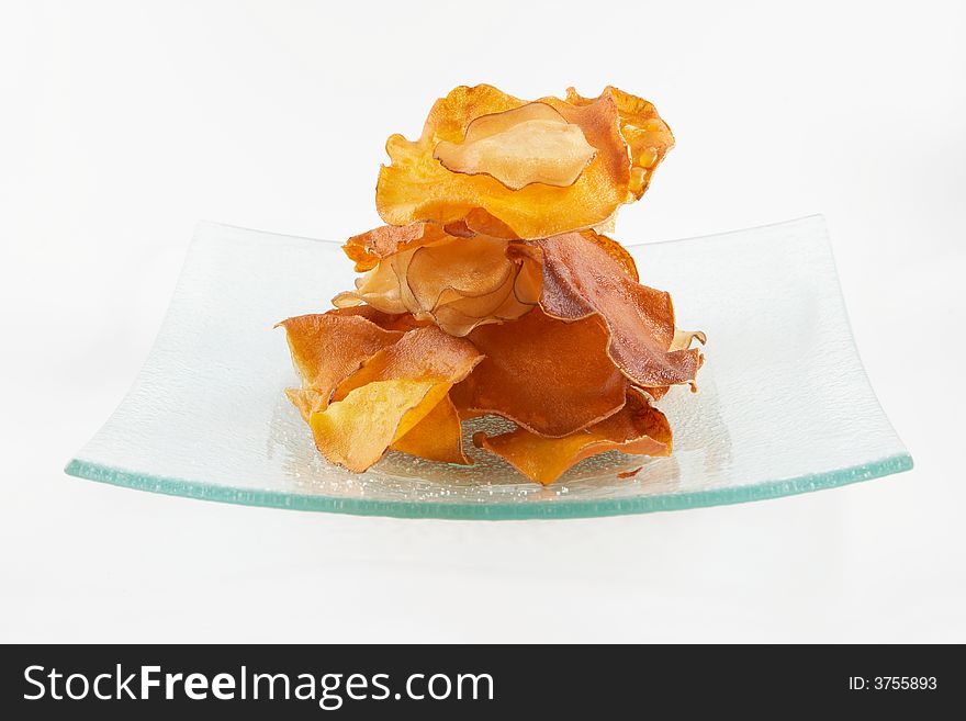 Fried sweet potatoes served in a glass dish