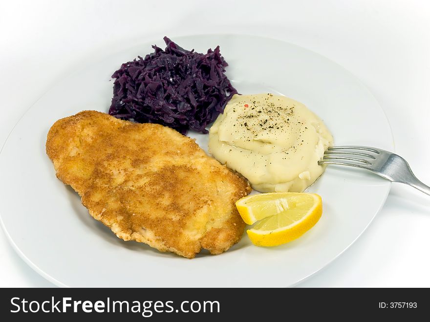 Viennese steak,puree with red cabbage