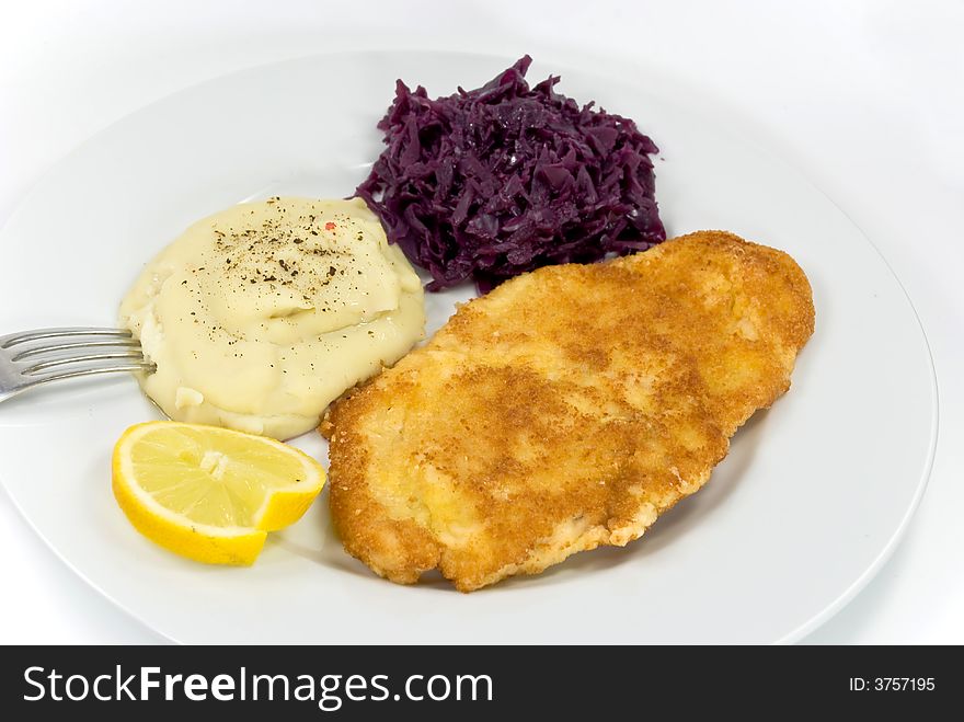 Viennese steak,puree with red cabbage.