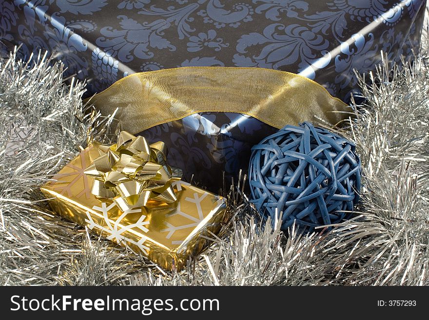 Christmas gifts, presents, wrapped with decorative stars and ribbons composition. Christmas gifts, presents, wrapped with decorative stars and ribbons composition