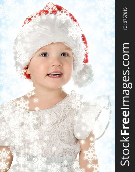 Baby in red hat with snowflake