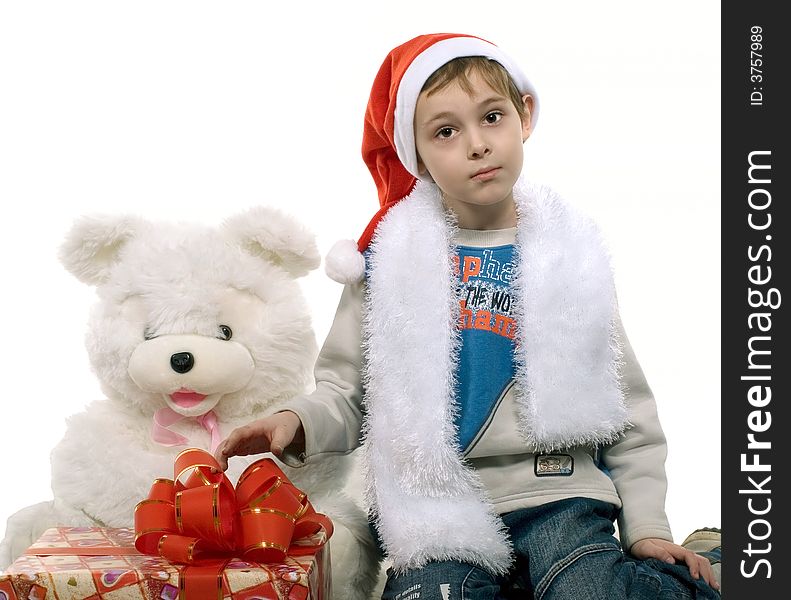 A celebratory card.
The boy in a suit of Santa dreams of gifts for Christmas . Isolated on a white background. Studio. A celebratory card.
The boy in a suit of Santa dreams of gifts for Christmas . Isolated on a white background. Studio.