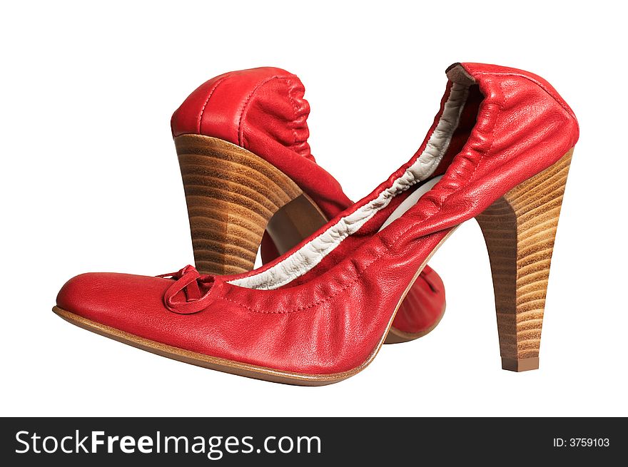 Red female shoes on a white background