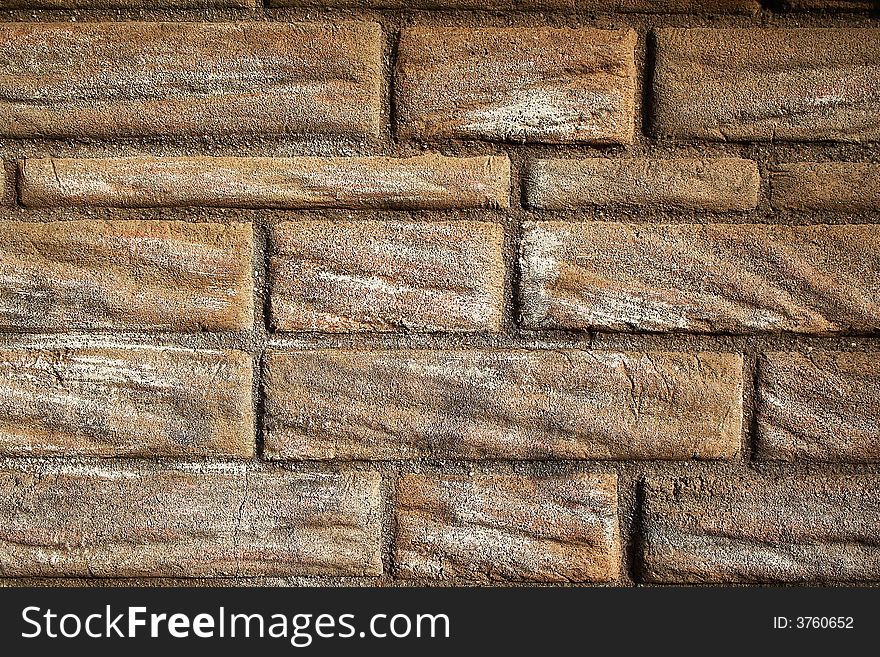 Brown stone house wall texture. Brown stone house wall texture