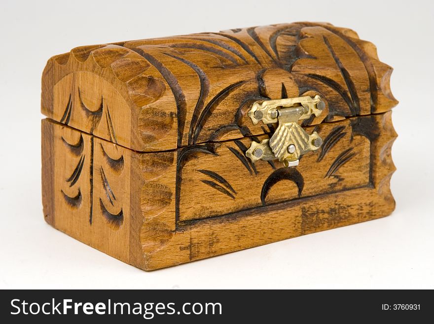 Wooden carved retro box with gifts over white