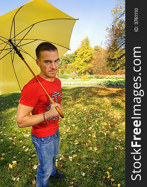 Funny guy with yellow umbrella