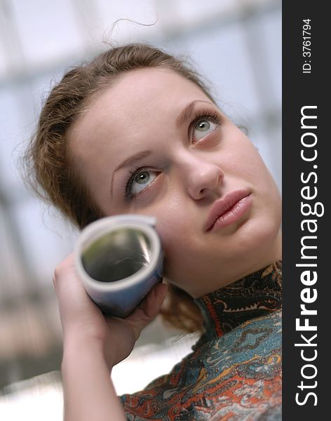 Portrait of young woman with  book in hands. Portrait of young woman with  book in hands