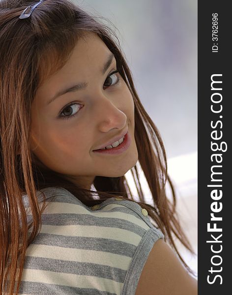 Portrait of  girl at  window in room, close up. Portrait of  girl at  window in room, close up