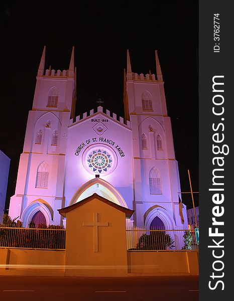 Spooky night old church with purple light