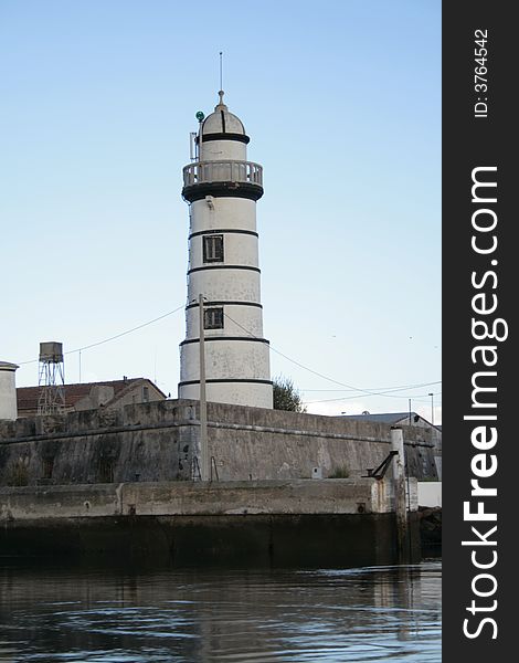 Lighthouse in front of the water. Lighthouse in front of the water