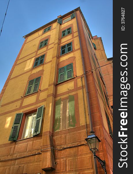 A painted building typical of Liguria region in italy. A painted building typical of Liguria region in italy