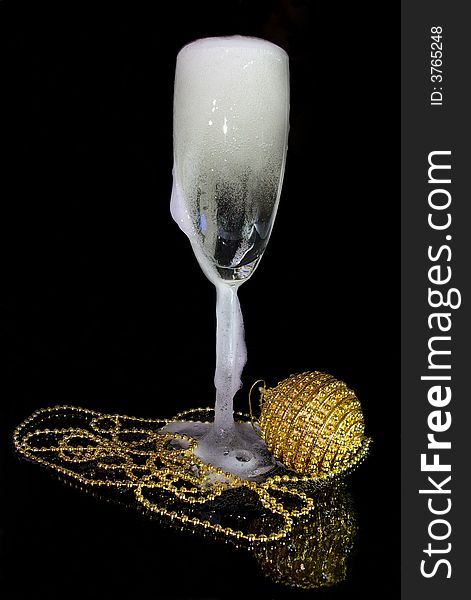 Glass Of Champagne And Christmas Decoration