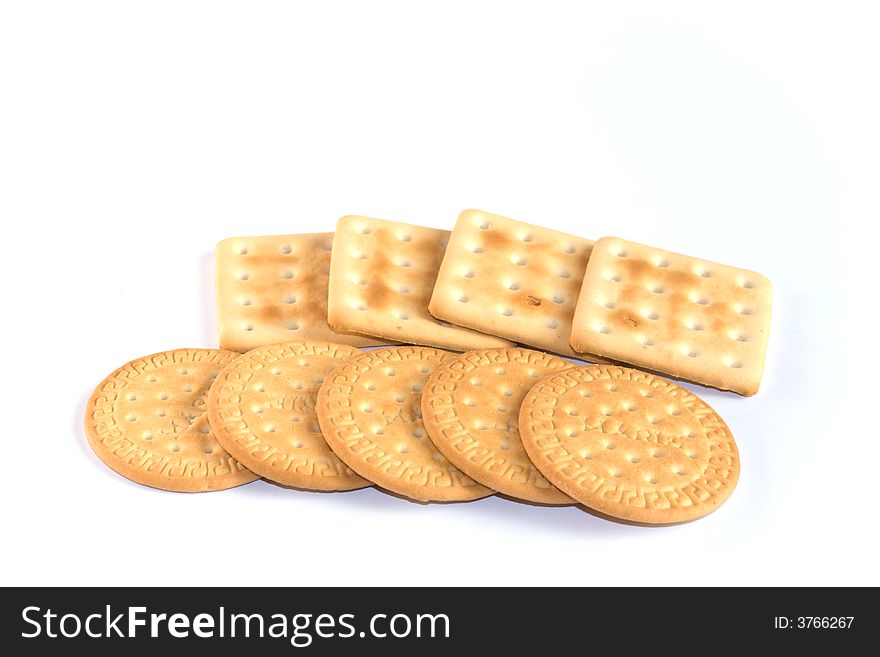 Round and square cookies on white background