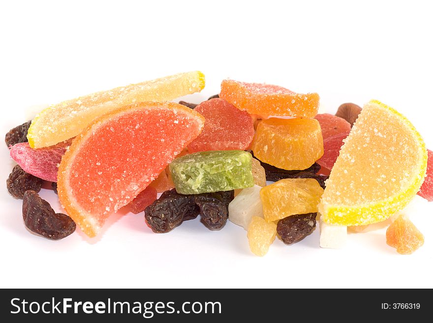 Dried fruits, raisins, candies and nuts on white backgroud. Dried fruits, raisins, candies and nuts on white backgroud