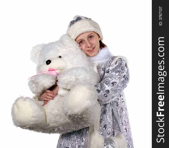 A celebratory card.
 The smiling girl in clothes of a Snow Maiden with gifts on a white background. Isolated. Studio.