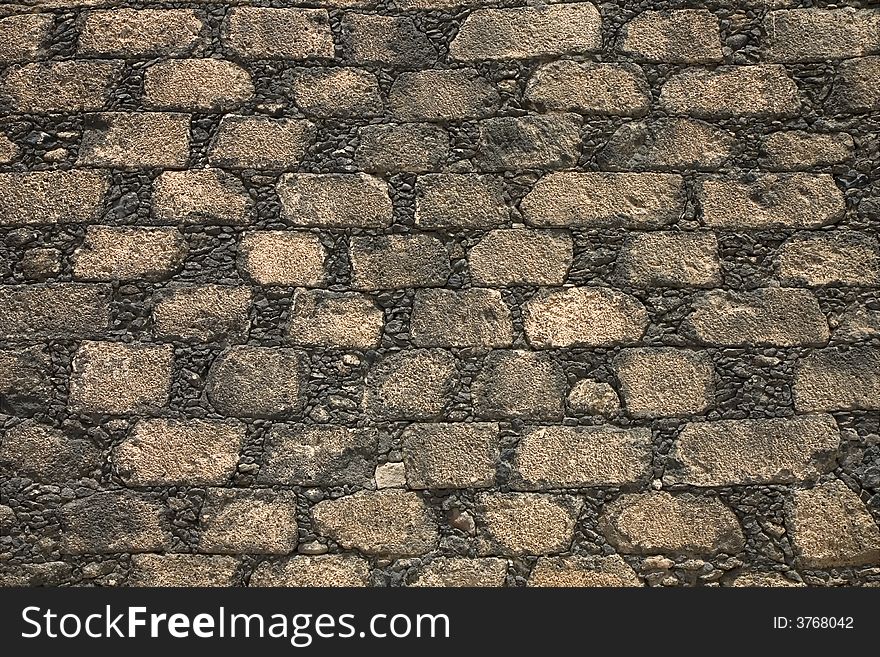 Stone wall made of volcanic rocks in Lanzarote, Canary Islands, Spain