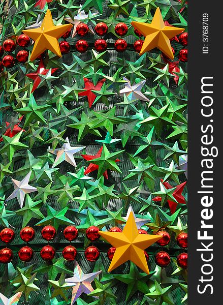 Shopping mall christmas tree showing difference size of stars. Shopping mall christmas tree showing difference size of stars