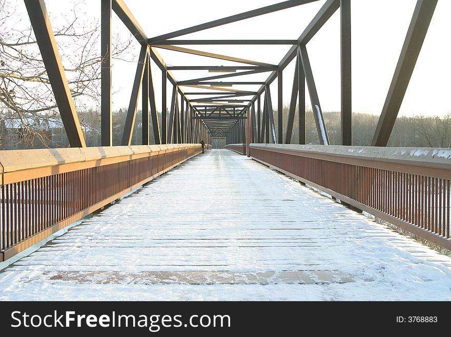 A snow covered foot bridge in Edmonton,Alberta,Canada. A snow covered foot bridge in Edmonton,Alberta,Canada.