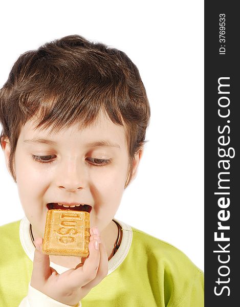 Kid eating dollar cookies on white background