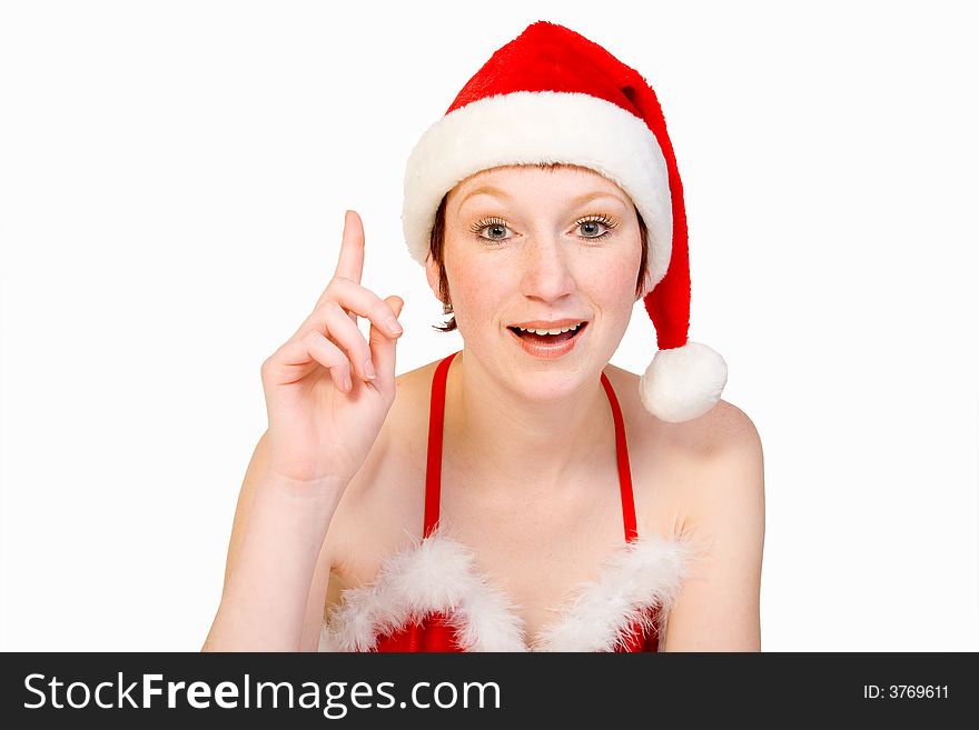 Beautifull girl in christmas bikini and with christmas hat puts her finger up in order to ask a question . With background clipping path for your convenience. Beautifull girl in christmas bikini and with christmas hat puts her finger up in order to ask a question . With background clipping path for your convenience