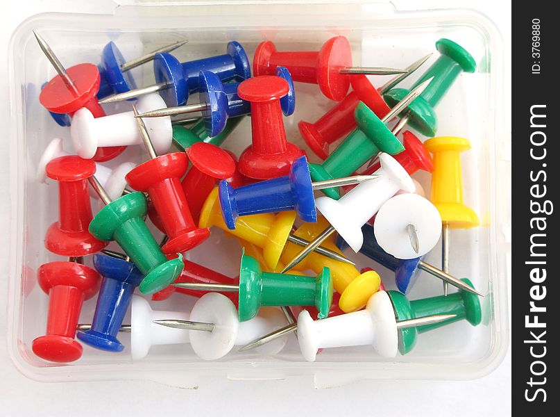 Colorful push-pins in the box. Colorful push-pins in the box