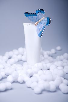 Cosmetic Tube And Butterfly Royalty Free Stock Photo