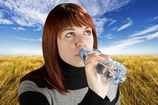 Redhead Girl Drinking Water Stock Photo Redhead Girl Drinking Water Stock Photo