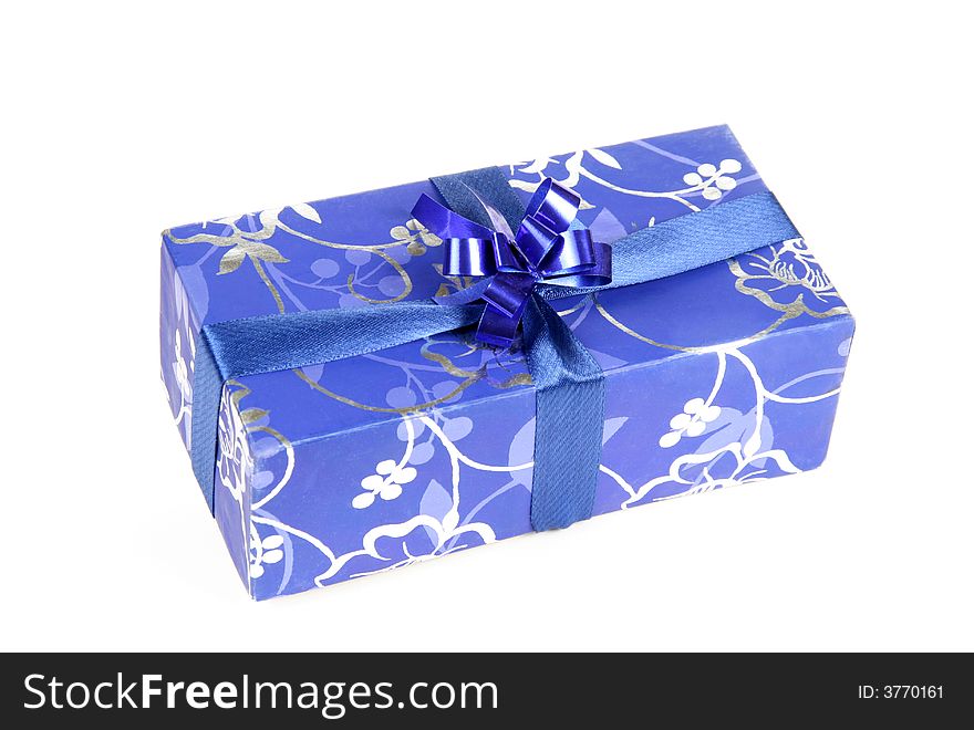 Blue gift box with ribbon isolated on white background