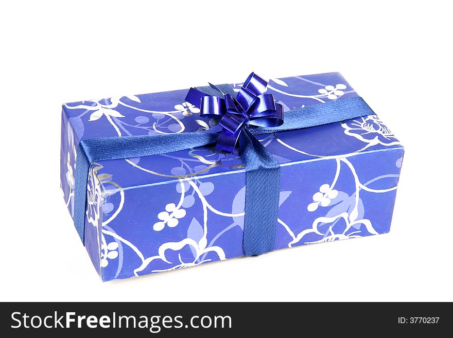 Blue gift box with ribbon isolated on white background