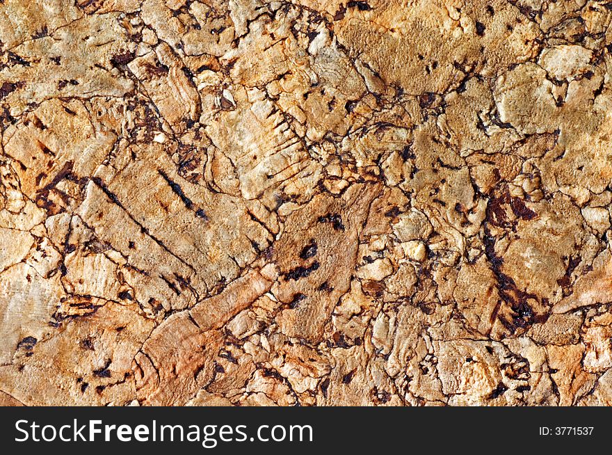 Cork tiles together for a brown cork textured background.