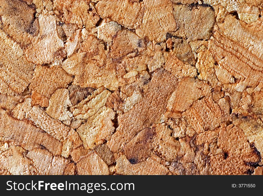 Cork tiles together for a brown cork textured background.