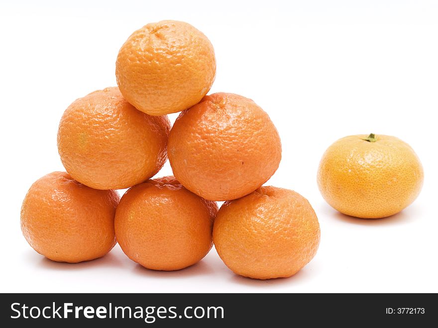 Pyramid of oranges and mandarins. Pyramid of oranges and mandarins
