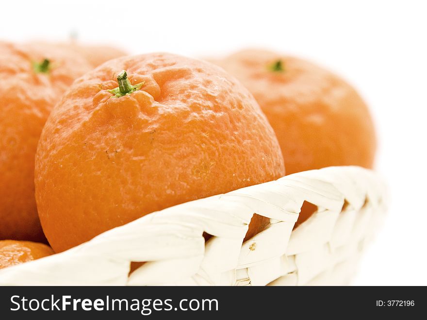 Closeup of a basket of oranges and mandarins. Closeup of a basket of oranges and mandarins