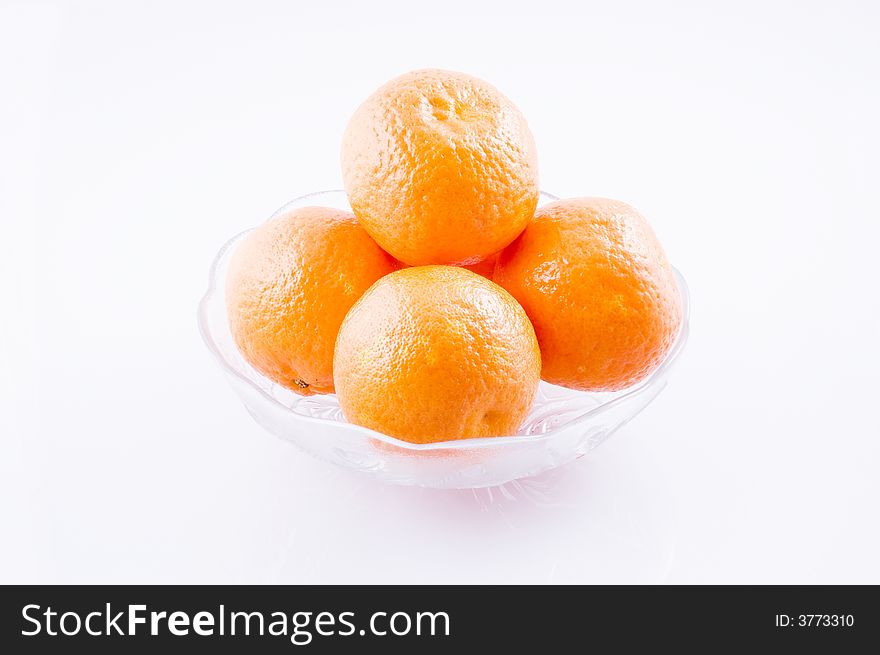 Four Tangerine in small glass