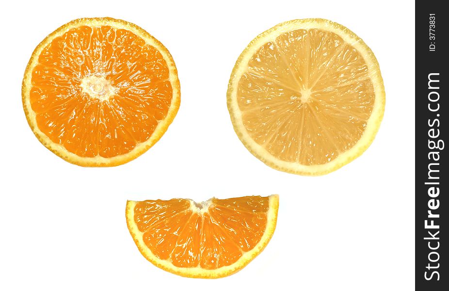 Orange and lemon slices isolated on a white background. Orange and lemon slices isolated on a white background