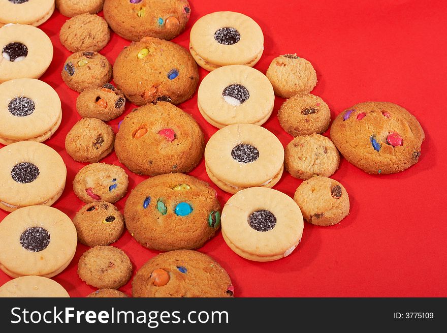 Chocolate chip cookies on a red background. Chocolate chip cookies on a red background