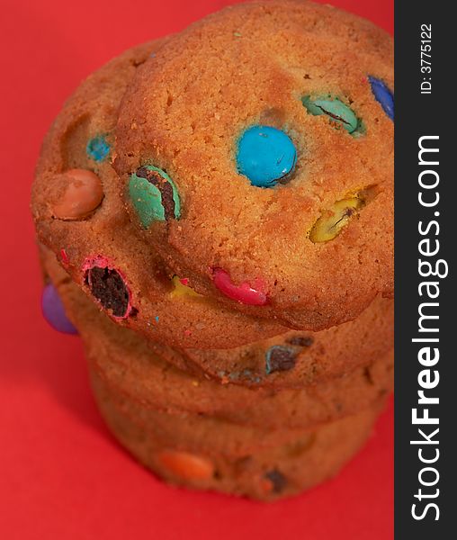 Tasty chocolate chip cookies on a red background. Tasty chocolate chip cookies on a red background