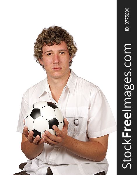Soccer player holding football in his hands. Soccer player holding football in his hands