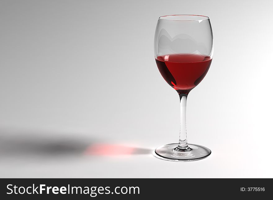 Red wine in the wineglass on  the white background