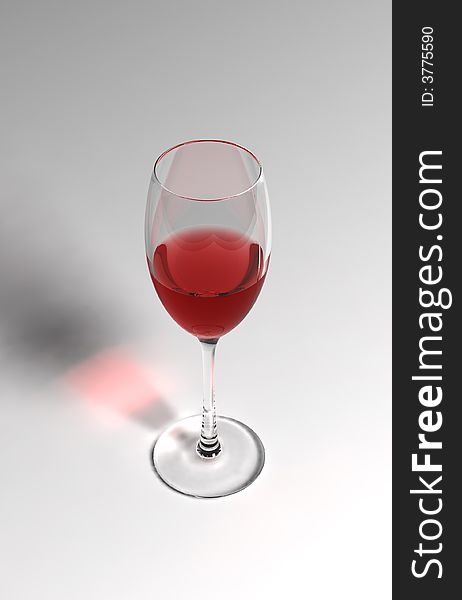 Red wine in the wineglass on  the white background