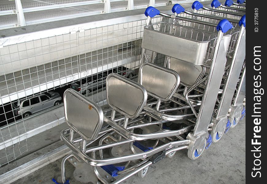 Rows Of Trolleys At The Airport