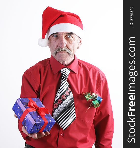 Businessman with Christmas gift and Santa Claus hat. Businessman with Christmas gift and Santa Claus hat.