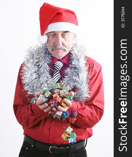 Businessman with Christmas gift and Santa Claus hat. Businessman with Christmas gift and Santa Claus hat.