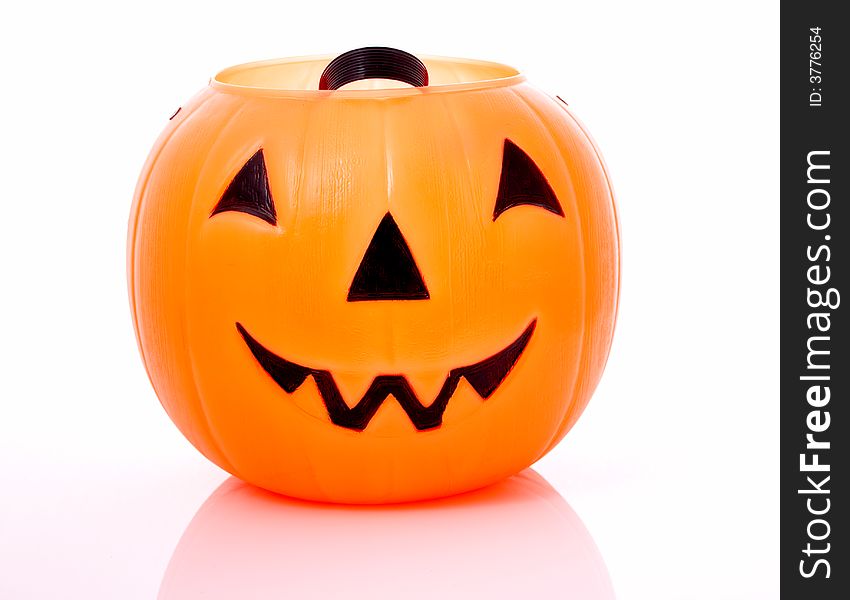 A halloween pumpkin over a white background