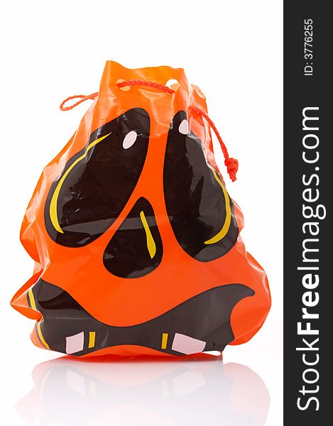 A trick or treat bag over a white background. A trick or treat bag over a white background