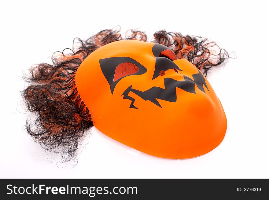 A scary halloween mask over a white background. A scary halloween mask over a white background