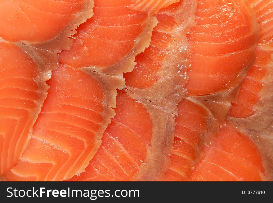 Abstract background of red fish slices. Abstract background of red fish slices